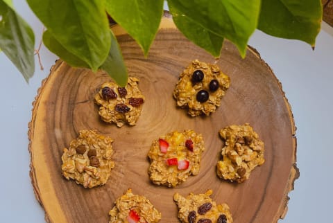 oatmeal cookies on board with fruit toppings 